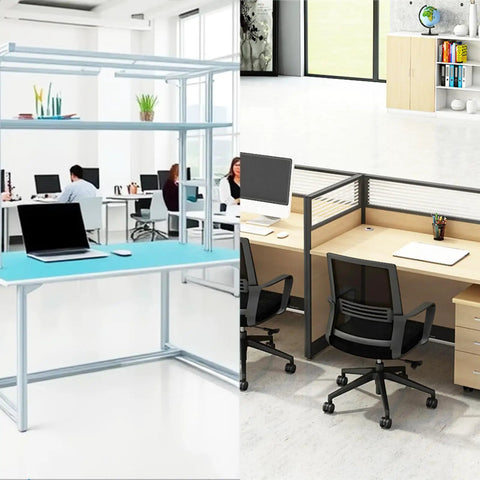 Modern office workspace with desks and chairs, featuring an unfinished frame structure. Brightly lit with natural light from windows.