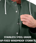 Close-up of Pro-Grade 0.70mm PVC Fishing Rain Suit Jacket And Bib Pants Set for Commercial Anglers, dark green, windproof storm flap.