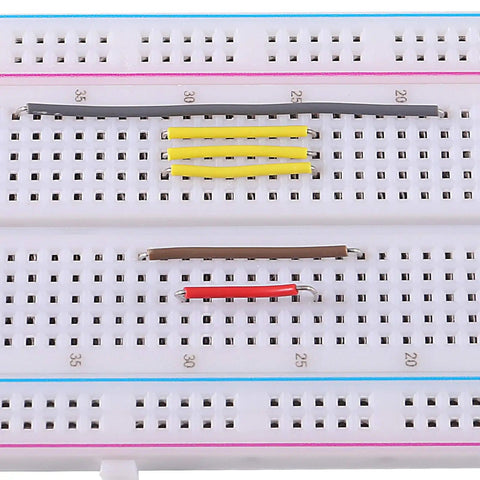 560 Piece Jumper Wire Kit With 14 Lengths For Breadboard Prototyping And Arduino Projects, wires inserted in breadboard.