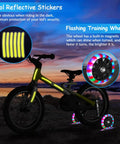 Quiet Heavy Duty Training Wheels For Kids Bikes Stabilizer Kit Ride Ready Adjustable Metal And Rubber Fits 12 To 20 Inch Single Speed Bicycles Includes Bell And Reflective Sticker For Safety Noiseless Easy Install with glowing stickers and flashing wheels on a bike at dusk.
