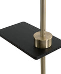 Close-up of brass finish USB floor lamp with built-in tray and USB port for easy charging, featuring walnut wood grain shelf.