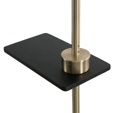 Close-up of brass finish USB floor lamp with built-in tray and USB port for easy charging, featuring walnut wood grain shelf.