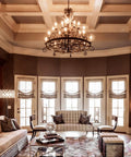 Elegant living room with chandelier, featuring 12-Pack Dimmable E12 LED Candelabra Bulbs 40W Equivalent 2700K Warm White lamps.