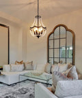Crystal Four Light Chandelier Black Farmhouse Pendant Fixture for dining room above elegant seating area