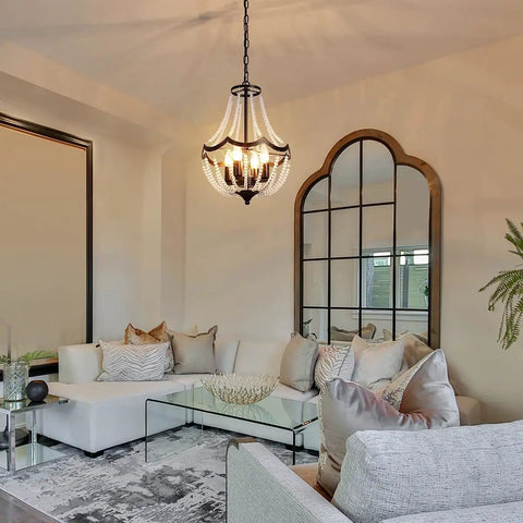 Crystal Four Light Chandelier Black Farmhouse Pendant Fixture for dining room above elegant seating area