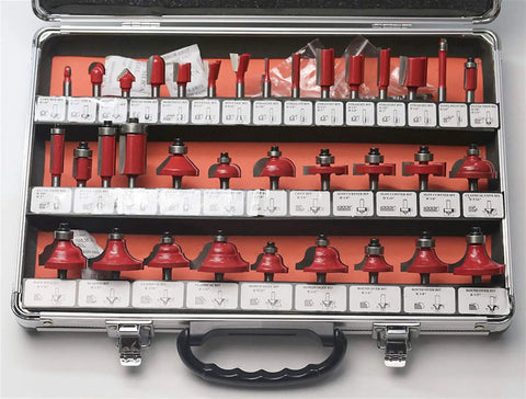 Top Shelf Tungsten Carbide Router Bit Set Featuring Hella Tough 6Mm Shank And 35 Precision Woodworking Cutters locked in a wooden case.