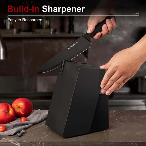 15 Piece Kitchen Knife Set With Built In Sharpener Block German Stainless Steel Blades in use with black wood block on counter