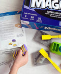 Child using Magnet Science Kit For Kids Ages 8 To 12 Hands On STEM Fun With Magnetic Levitation Build A Compass Explore Magnetic Trains And 9 Real Experiments Using 20 Lab Tools For Big Brain Magnetic Discovery.
