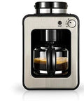 Versatile One Touch Coffee Maker That Grinds Beans Or Mills Soybean Flour with heat-resistant carafe and removable filter.