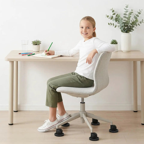 Child sitting on office chair with 8 Pack Furniture Caster Cups With Rubber Bed Stoppers For All Furniture Wheels, Chair Coasters And Floor Protectors, Vacuum Adsorption Design To Stop Rolling And Prevent Scratches On Sofas, Beds, Pianos.