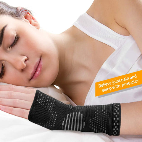 Woman sleeping wearing Wrist Compression Sleeves Pair For Carpal Tunnel Pain Relief And Support For Women And Men.