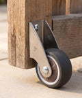 Two Inch Low Profile Door Support Wheels, Anti Sag Caster Rollers For Solid Wood Doors And Gates mounted on wooden gate