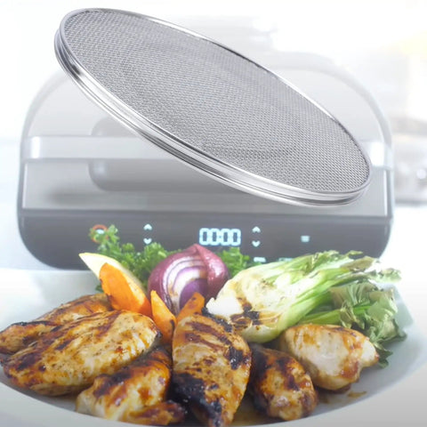 Top Notch Stainless Steel Splatter Shield For 5 In 1 Indoor Grill And Air Fryer above grilled food and vegetables.