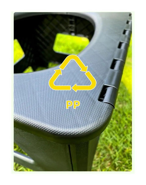 Close-up of Portable Camping Toilet For Outdoors Lightweight Rubber Mobile Toilet Gear showing material detail with recycle symbol.