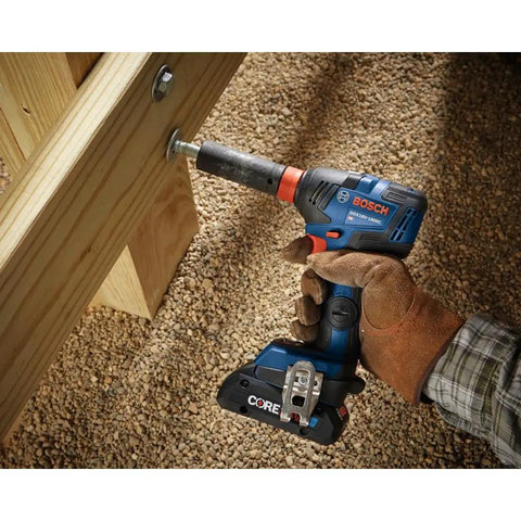 Worker using the 18V All In One Impact Driver And Wrench Kit With One Quarter Inch Hex Shank And One Half Inch Square Drive on wood.