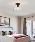 Semi Flush Mount Ceiling Light With Seeded Glass Shade In Black Finish Modern Farmhouse Style Fixture in bedroom setting