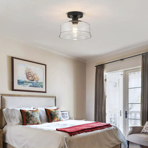 Semi Flush Mount Ceiling Light With Seeded Glass Shade In Black Finish Modern Farmhouse Style Fixture in bedroom setting