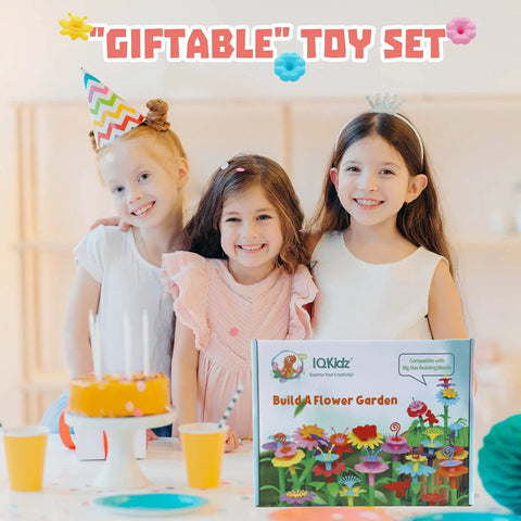 Three children smiling with Flower Garden Building Toy With Insect Pegs 153 Piece STEM Stacking Pretend Play Set.