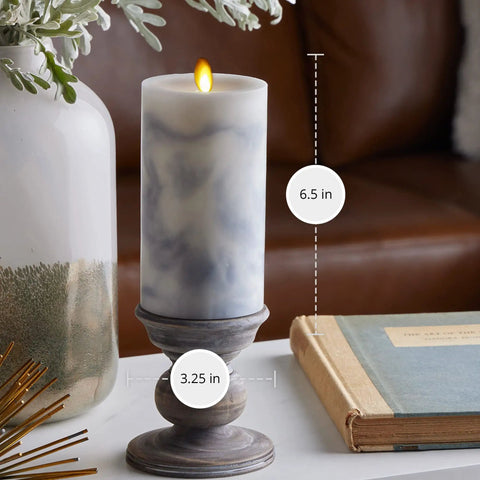 Realistic Marble Candles With Moving Flame LED Lights, 3.25x6.5 inches, on table beside vase and book, cozy room decor