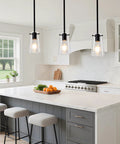 BESTWEST 3 Pack Pendant Lights Kitchen Island in matte black finish above a modern kitchen island with white cabinetry.