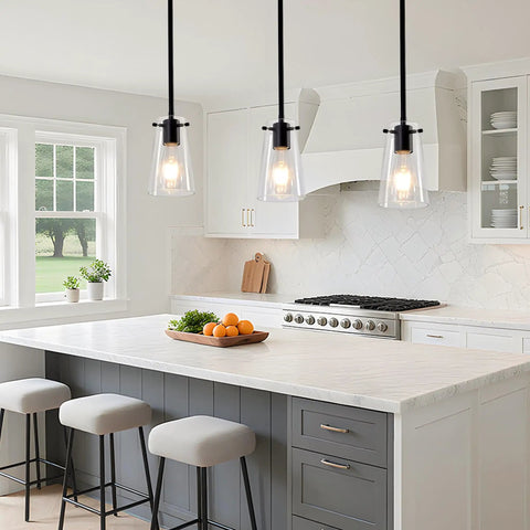 BESTWEST 3 Pack Pendant Lights Kitchen Island in matte black finish above a modern kitchen island with white cabinetry.