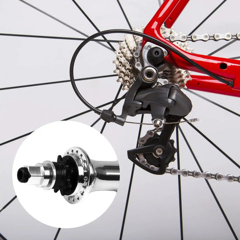 Close-up of a bike's rear derailleur and cassette with inset showing the Eight Piece Bike Headset Spacers Set For Road And Mountain Bikes Aluminum Alloy Washers With Seven Sizes 1.0 1.5 1.85 2.0 2.18 2.35 2.5 mm Easy Dial In For Cassette And Bottom Bracket Spacing.