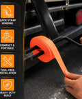 Heavy Duty Cargo Tie Down Strap Winder for Roll Up Flatbed Winch Straps Up To 4 Inches, Black Powder Coated Steel Hand Winder Tool For Trailers, Trucks, Vans, Warehouses And Docks, Built To Last And Easy Roll, shown winding an orange strap