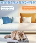 Self Warming Cat Mat And Self Heating Pet Bed That Traps Body Heat Machine Washable Reversible Crate Blanket Straight Up Comfy Grey Double Star Print on a cozy couch with cushions.