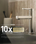 Modern brushed nickel faucet on kitchen countertop with Moen logo and "America's Most Trusted Faucet Brand" badge.