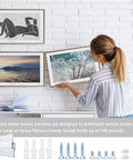 Built Tough Twelve Inch French Cleat Wall Mounting Kit With Complete Screws And Plastic Anchors For Quick No Fuss Setup Holding Up To Eighty Pounds For Wall Pictures Mirrors Artwork Lockers And Cabinets, woman hanging picture.