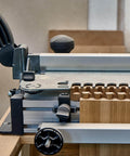 Pro Grade T Track Knob Kit With Four Star Knobs And Four Quarter Inch Twenty Threaded Bolts For Woodworking Jigs And Fixtures Drop In Sliding Bolts Accessories Silver installed on a woodworking jig