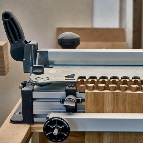 Pro Grade T Track Knob Kit With Four Star Knobs And Four Quarter Inch Twenty Threaded Bolts For Woodworking Jigs And Fixtures Drop In Sliding Bolts Accessories Silver installed on a woodworking jig