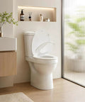 Hassle Free Quick Swap Elongated Toilet Seat With Built In Toddler Potty Chair And Silent Soft Close Hinges displayed in modern bathroom.