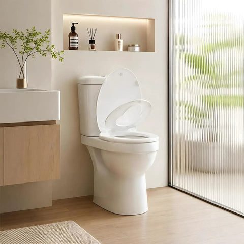 Hassle Free Quick Swap Elongated Toilet Seat With Built In Toddler Potty Chair And Silent Soft Close Hinges displayed in modern bathroom.
