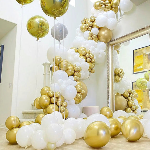 Top Tier 12 Inch Gold Latex Helium Balloons 50 Pack Slay Party Decorations in a stylish balloon arrangement.