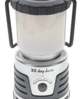 Beast Mode Bright 1000 Lumen LED Lantern With Titanium Finish for Outdoors on white background with hanging handles elevated