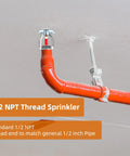 1/2 NPT Thread Sprinkler mounted on red pipe, showing standard thread for 1/2 inch installation, part of Six Pack Pro Grade Fire Sprinkler Heads One Half Inch Npt 155 Degrees Fahrenheit Upright Brass K80 Quick Response For Homes And Commercial Sites Built Tough Ready To Roll And Stay Secure.