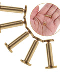 10 Piece Set Of Golden Copper Binding Screws For Scrapbooking And Bookbinding Projects Heavy Duty Craft Rivets shown in hand and display