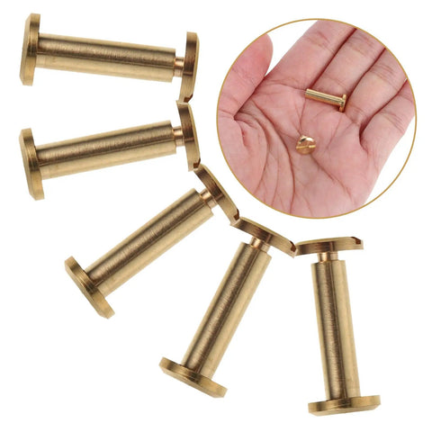 Solid Copper Binding Barrels And Screws For Scrapbooks And Photo Albums Heavy Duty Metal Rivet Replacement Kit, six pieces displayed with one in hand.