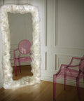 Thundercloud LED Cloud Light With 16 Feet Cord setup with pink chair, creating atmosphere in room corner.