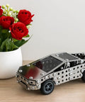 Stainless Steel Model Car Kit For Adults A Do It Yourself 3D Puzzle And Mechanical Engineering Toy That Feels Gearhead Vibe on table