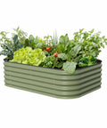 Olive Green 17 Inch Tall 6 In 1 Modular Metal Raised Garden Bed Kit For Vegetables And Flowers Yard Friendly Patio Ground Planter Box With Flexible Configurations DIY Ready with vibrant plants
