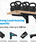 24 Inch Floating Shelf Bracket Set For Garage Heavy Duty Folding Wall Mounted Collapsible Shelves Max Load 330 Lb Pack Of 4 No Board Installation Ready Sturdy Support For Heavy Items showing installed with kettlebells