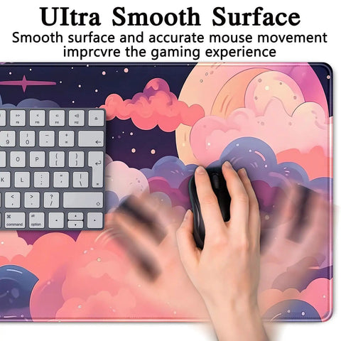 Close-up of Cute Desk Pad With Kawaii Clouds In Pink And Purple XXL Full Desk Mat For Gaming And Work, showing keyboard and hand on mouse.