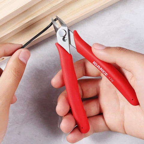 Person using Precision Wire Cutters Flush Cutters For Electronics And Jewelry Making, Spring Loaded Side Cutting Pliers on soft wire