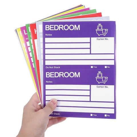 Hand holding Color Coded Moving Box Labels 160 Pack With Writable Notes Area 6x4 Inches Scuff Resistant Paper Stickers for organization