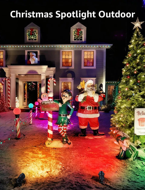Festive night scene with Christmas decorations illuminated by 12W RGB Low Voltage Landscape Lights With RF Remote, Waterproof Outdoor Yard Garden Pathway Color Changing Spotlights, 2 Pack With Connectors, Die Cast Aluminum Housing, 50 Ft Remote Range, Easy Install