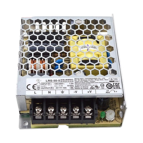 Heavy Duty Industrial Power Supply Serving Smooth Five Volt Ten Amp Dc Juice For Automation Led Arrays And Telecom Racks With Universal Vac Input Built Like A Tank For Non Stop Factory Shifts, metal enclosure with ventilation.