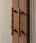 Hammered Antique Brass Cabinet Pulls 5 Inch Center Hole 10 Pack Vintage Vibe Handles Installed on Cabinet