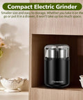Electric Herb Grinder With Press Down Lid Fast Even Grinding Powerful Motor For Spices And Herbs Compact Kitchen Appliance in a kitchen cabinet